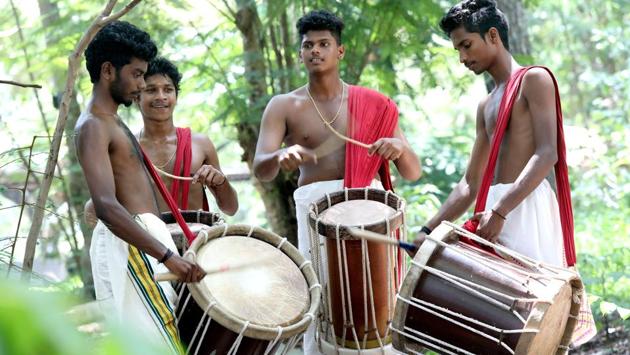 Percussion (chenda) artists add to the fervour of celebration . Percussion (chenda) artists add to the fervour of celebration .