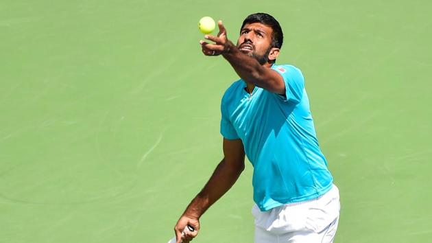 Indian tennis player Rohan Bopanna won his mixed doubles opener with Gabriela Dabrowski at the US Open on Saturday. (AFP) Indian tennis player Rohan Bopanna won his mixed doubles opener with Gabriela Dabrowski at the US Open on Saturday. (AFP)