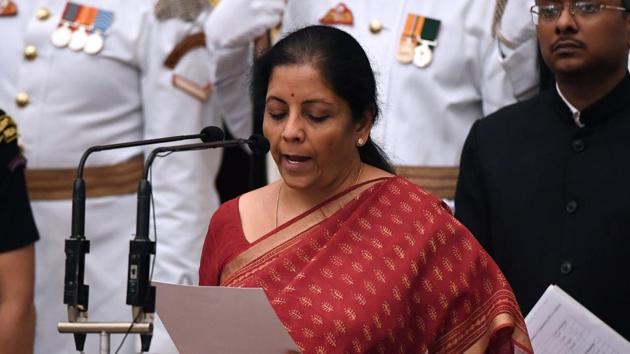 Nirmala Sitharaman takes the oath during the swearing-in ceremony in New Delhi on Sunday .(Reuters photo)