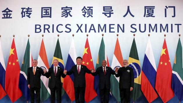 From left, Brazil's President Michel Temer, Russian President Vladimir Putin, Chinese President Xi Jinping, South Africa's President Jacob Zuma and Indian Prime Minister Narendra Modi pose for a group photo during the BRICS Summit at the Xiamen International Conference and Exhibition Center in Xiamen, southeastern China's Fujian Province.(AP Photo) From left, Brazil's President Michel Temer, Russian President Vladimir Putin, Chinese President Xi Jinping, South Africa's President Jacob Zuma and Indian Prime Minister Narendra Modi pose for a group photo during the BRICS Summit at the Xiamen International Conference and Exhibition Center in Xiamen, southeastern China's Fujian Province.(AP Photo)