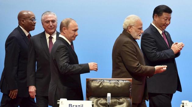 Xiamen : BRICS leaders from left to right, South Africa's President Jacob Zuma, Brazilian President Michel Temer, Russian President Vladimir Putin, Indian Prime Minister Narendra Modi, and Chinese President Xi Jinping attend BRICS Business Council and Signing ceremony, at the BRICS Summit in Xiamen, Fujian province, China, Monday. (AP Photo) Xiamen : BRICS leaders from left to right, South Africa's President Jacob Zuma, Brazilian President Michel Temer, Russian President Vladimir Putin, Indian Prime Minister Narendra Modi, and Chinese President Xi Jinping attend BRICS Business Council and Signing ceremony, at the BRICS Summit in Xiamen, Fujian province, China, Monday. (AP Photo)
