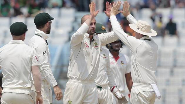 Nathan Lyon, center, celebrates with Australian cricket teammates after the dismissal of a Bangladesh batsman in Chittagong. (AP) Nathan Lyon, center, celebrates with Australian cricket teammates after the dismissal of a Bangladesh batsman in Chittagong. (AP)