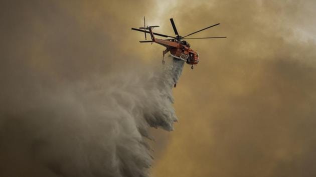 The blue skies over the San Fernando Valley were filled with thick smoke from the fire. On Friday evening, when it first burst out of control its flames could be seen from 10 miles away, shooting over the Verdugo ridge line on the north side of the valley. The fire burned in parts of the cities of Los Angeles, Burbank and Glendale. (AFP) The blue skies over the San Fernando Valley were filled with thick smoke from the fire. On Friday evening, when it first burst out of control its flames could be seen from 10 miles away, shooting over the Verdugo ridge line on the north side of the valley. The fire burned in parts of the cities of Los Angeles, Burbank and Glendale. (AFP)