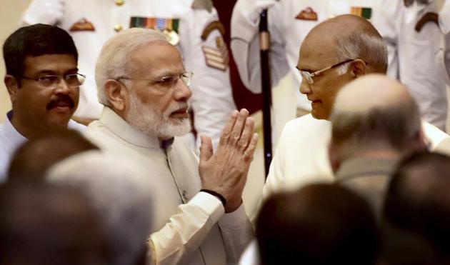Prime Minister Narendra Modi exchanges greetings with President Ram Nath Kovind and new cabinet ministers after the reshuffle at Rashtrapati Bhavan in New Delhi on Sunday. (PTI) Prime Minister Narendra Modi exchanges greetings with President Ram Nath Kovind and new cabinet ministers after the reshuffle at Rashtrapati Bhavan in New Delhi on Sunday. (PTI)