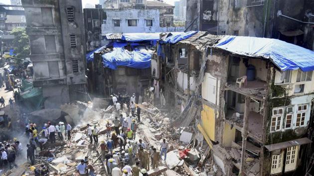 The protest comes days after a 117-year-old collapsed in Bhendi Bazaar, killing 33. (PTI) The protest comes days after a 117-year-old collapsed in Bhendi Bazaar, killing 33. (PTI)