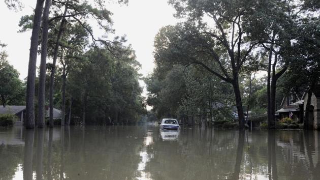 A neighbourhood in Houston that was flooded after hurricane Harvey struck the region. Two Indians who were rescued from a lake have died. (AP / Representative photo) A neighbourhood in Houston that was flooded after hurricane Harvey struck the region. Two Indians who were rescued from a lake have died. (AP / Representative photo)