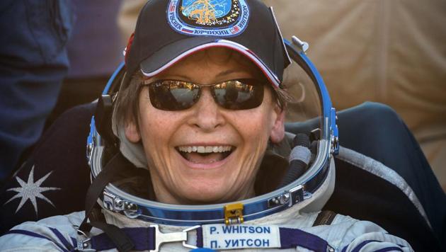 US astronaut Peggy Annette Whitson smiles after landing in a remote area outside the town of Dzhezkazgan, Kazakhstan.(AP Photo)
