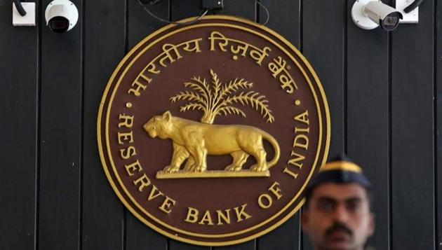 A security personnel member stands guard at the entrance of the Reserve Bank of India (RBI) headquarters in Mumbai, August 2, 2017. (Reuters) A security personnel member stands guard at the entrance of the Reserve Bank of India (RBI) headquarters in Mumbai, August 2, 2017. (Reuters)