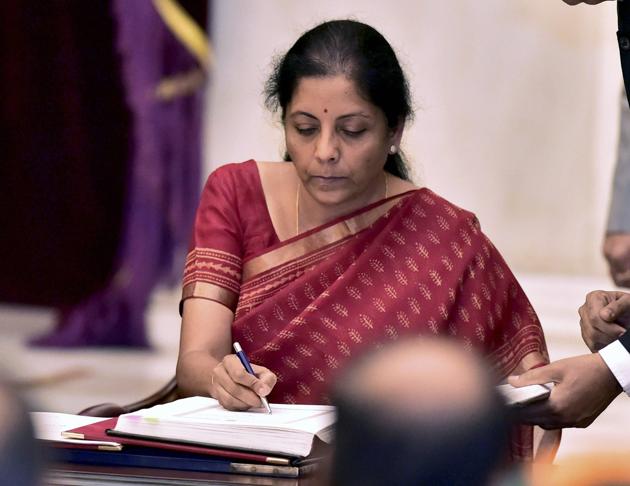 Nirmala Sitharaman signing the register after taking oath as a cabinet minister at Rashtrapati Bhavan in New Delhi on Sunday. Sitharaman has become India’s 2nd woman defence minister after Indira Gandhi. (PTI Photo) Nirmala Sitharaman signing the register after taking oath as a cabinet minister at Rashtrapati Bhavan in New Delhi on Sunday. Sitharaman has become India’s 2nd woman defence minister after Indira Gandhi. (PTI Photo)