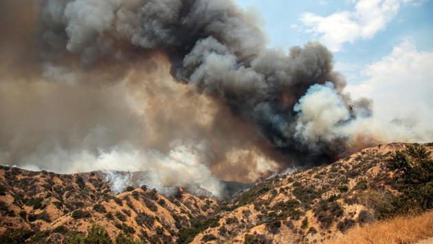 Los Angeles Mayor Eric Garcetti said that the wildfire is the largest in terms of acreage in the city’s history. It was considered 30 percent contained by late Sunday night, up from 10 percent Sunday morning. (Kyle Grillot / REUTERS) Los Angeles Mayor Eric Garcetti said that the wildfire is the largest in terms of acreage in the city’s history. It was considered 30 percent contained by late Sunday night, up from 10 percent Sunday morning. (Kyle Grillot / REUTERS)