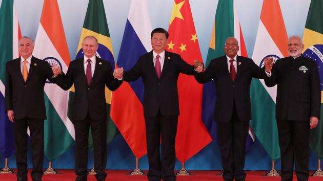(From Left) Brazil’s President Michel Temer with his Russian counterpart Vladimir Putin, Chinese President Xi Jinping, South Africa’s President Jacob Zuma and Prime Minister Narendra Modi during the BRICS Summit in Xiamen in China on Monday.(AFP Photo)