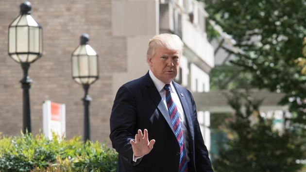 US President Donald Trump waves to the press as he walks out of St John's Epicopal Church in Washington, DC, on September 3. (AFP Photo) US President Donald Trump waves to the press as he walks out of St John's Epicopal Church in Washington, DC, on September 3. (AFP Photo)