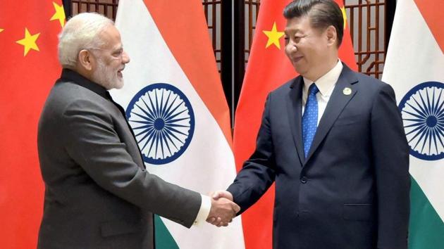 Prime Minister Narendra Modi with Chinese President Xi Jinping meet on the sidelines of the 9th BRICS Summit in Xiamen on Tuesday.(PTI)