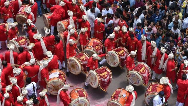 Dhol tasha sqauds during the procession of Ganesh visarjan in Pune. The festival is synonymous with the sounds of ‘Ganpati Bappa Morya’ chanted by devotees in processions throughout the 10-day period, calling the deity back to their homes as soon as possible next year. (Pratham Gokhale/ HT Photo) Dhol tasha sqauds during the procession of Ganesh visarjan in Pune. The festival is synonymous with the sounds of ‘Ganpati Bappa Morya’ chanted by devotees in processions throughout the 10-day period, calling the deity back to their homes as soon as possible next year. (Pratham Gokhale/ HT Photo)