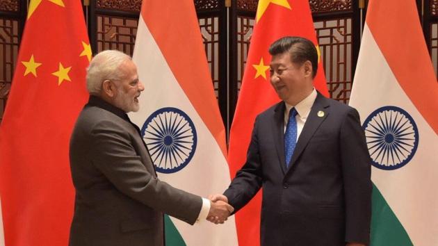Prime Minister Narendra Modi shakes hand with Chinese President Xi Jinping.(Twitter/Narendra Modi)