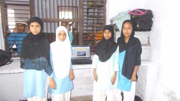 Students photographed with a laptop at a madrasa in Nalanda, Lucknow.(HT Photo) Students photographed with a laptop at a madrasa in Nalanda, Lucknow.(HT Photo)
