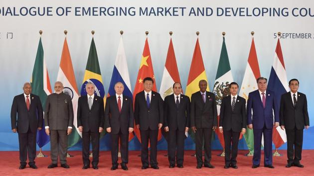States leaders (L-R) South Africa's President Jacob Zuma, Indian Prime Minister Narendra Modi, Brazilian President Michel Temer, Russian President Vladimir Putin , Chinese President Xi Jinping, Egypt's President Abdel-Fattah el-Sissi, Guinea's President Alpha Conde, Mexico's President Enrique Pena Nieto, Tajikistan's President Emomali Rahmon, Thai Prime Minister Prayuth Chan-ocha at the 2017 BRICS summit (AP)