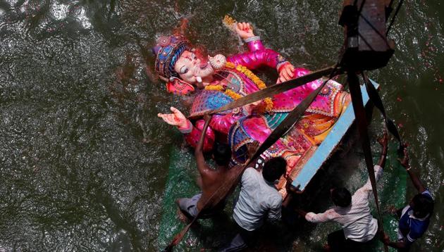 The immersion of Ganesha idols amid chants of Ganpati Bappa Moraya, Pudhchya Varshi Lavkar Ya (come back soon next year) today, marks the end of the 10 day Ganesh Chaturthi festival. During Ganeshotsav, devotees thronged pandals across the country, and feasted on sweets such as modak, which is considered Ganesha’s favourite. (REUTERS/Amit Dave) The immersion of Ganesha idols amid chants of Ganpati Bappa Moraya, Pudhchya Varshi Lavkar Ya (come back soon next year) today, marks the end of the 10 day Ganesh Chaturthi festival. During Ganeshotsav, devotees thronged pandals across the country, and feasted on sweets such as modak, which is considered Ganesha’s favourite. (REUTERS/Amit Dave)