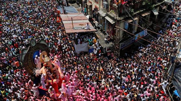 Thousands of devotees came out on the roads of Mumbai on Tuesday to immerse the idols, big and small; of Hindu god Ganesha at various points in the city after the end of the 10-day celebrations as the police put traffic restrictions in place and issued several security advisories. (REUTERS/Shailesh Andrade) Thousands of devotees came out on the roads of Mumbai on Tuesday to immerse the idols, big and small; of Hindu god Ganesha at various points in the city after the end of the 10-day celebrations as the police put traffic restrictions in place and issued several security advisories. (REUTERS/Shailesh Andrade)