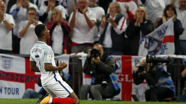 England football team striker Marcus Rashford celebrates scoring the winner against Slovakia in their Fifa World Cup 2018 qualification match at Wembley Stadium in London on Monday.(AFP)