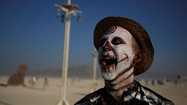 With no real dress codes, Burning Man is perhaps the largest opportunity for adults to step out in outlandish costumes and dressing styles outside of Halloween. Coordinated group outfits, facepaint, bodysuits and over the top accessories --Burning Man welcomes all. (Jim Urquhart / REUTERS) 
