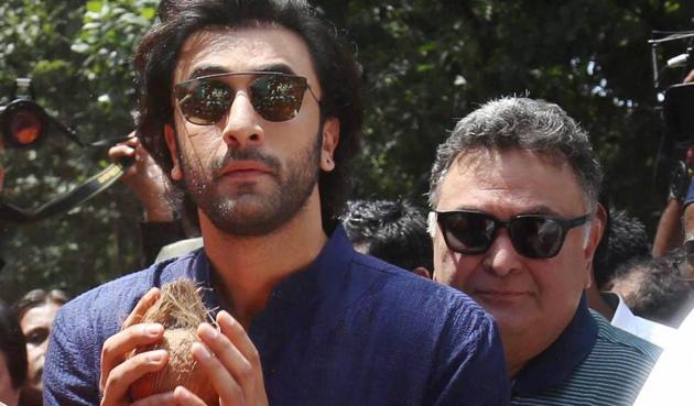 Ranbir Kapoor and Rishi Kapoor take part in Ganpati immersion procession at RK Studio in Mumbai on Tuesday. (PTI) Ranbir Kapoor and Rishi Kapoor take part in Ganpati immersion procession at RK Studio in Mumbai on Tuesday. (PTI)