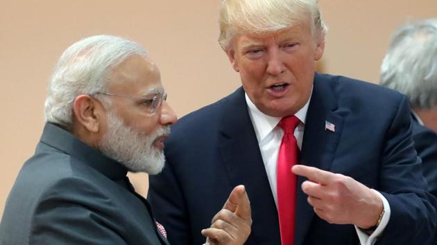 US President Donald Trump talks with Prime Minister Narendra Modi as they attend a working session during the G20 summit in Hamburg, northern Germany. (AFP Photo) US President Donald Trump talks with Prime Minister Narendra Modi as they attend a working session during the G20 summit in Hamburg, northern Germany. (AFP Photo)