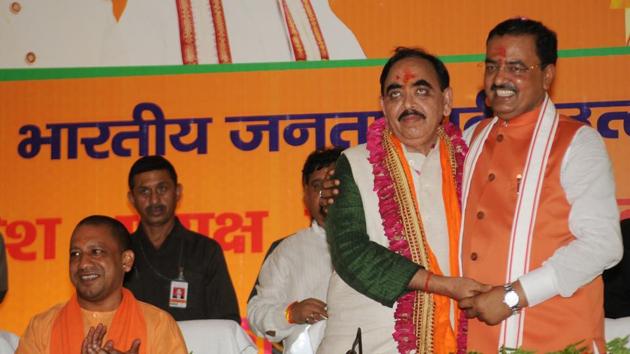 New UP BJP chief Mahendra Nath Pandey with his predecessor and now deputy CM Keshav Prasad Maurya. (Subhankar Chakraborty/HT PHOTO) New UP BJP chief Mahendra Nath Pandey with his predecessor and now deputy CM Keshav Prasad Maurya. (Subhankar Chakraborty/HT PHOTO)