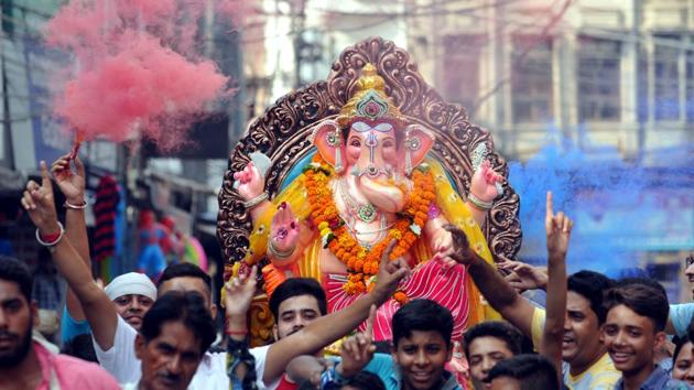 Devotees dancing during procession of Lord Ganesha on the eve of Ganesh immersion at Jalandhar on Thursday. (Pardeep Pandit/HT Photo) Devotees dancing during procession of Lord Ganesha on the eve of Ganesh immersion at Jalandhar on Thursday. (Pardeep Pandit/HT Photo)