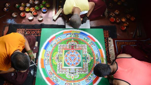Monks make a mandala using natural colors ahead of a prayer ceremony for their spiritual guru Kyabje Taklung Tretrul Rinpochhe. He died at 89 at Bodh Gaya in 2015 when his disciples decided to bring the body back to Shimla and preserve it. Two attendants, who were with him round the clock, Geogang Wanchuk and Paljor, say Rinpoche died in meditation, a stage short of achieving nirvana. (Deepak Sansta / HT Photo) Monks make a mandala using natural colors ahead of a prayer ceremony for their spiritual guru Kyabje Taklung Tretrul Rinpochhe. He died at 89 at Bodh Gaya in 2015 when his disciples decided to bring the body back to Shimla and preserve it. Two attendants, who were with him round the clock, Geogang Wanchuk and Paljor, say Rinpoche died in meditation, a stage short of achieving nirvana. (Deepak Sansta / HT Photo)