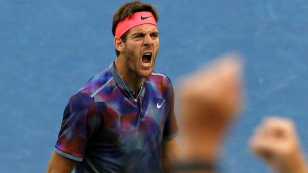 Juan Martin del Potro of Argentina saved two match points and came back from two sets down to beat Dominic Thiem of Austria. (REUTERS)