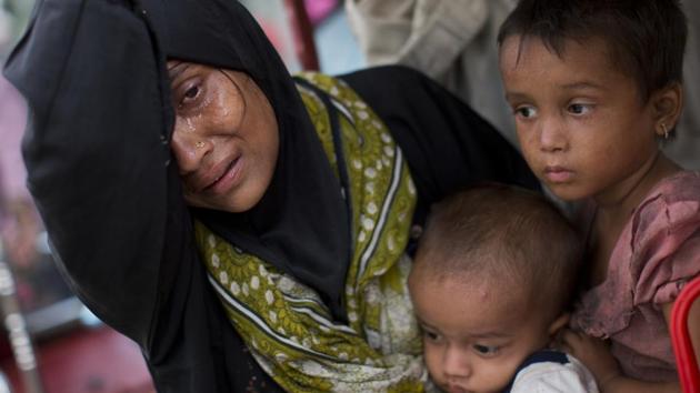An army crackdown triggered by an attack on August 25, 2017 by members of the Rohingya Arakan Salvation Army on Myanmar security forces and the response of a ‘clearance operation’ launched by security forces supported by Buddhist militia has led to the killing of at least 400 people, reports of arson and violence in Rakhine villages and the exodus of nearly 146,000 Rohingya to neighbouring Bangladesh in the weeks since, leading to an upsurge in this long running humanitarian crisis. (Bernat Armangue / AP) An army crackdown triggered by an attack on August 25, 2017 by members of the Rohingya Arakan Salvation Army on Myanmar security forces and the response of a ‘clearance operation’ launched by security forces supported by Buddhist militia has led to the killing of at least 400 people, reports of arson and violence in Rakhine villages and the exodus of nearly 146,000 Rohingya to neighbouring Bangladesh in the weeks since, leading to an upsurge in this long running humanitarian crisis. (Bernat Armangue / AP)