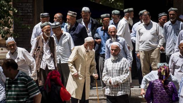 Local Muslims leaving a mosque after Friday prayers in Hotan, in China's Xinjiang Uighur Autonomus Region on June 23. (AFP File Photo) Local Muslims leaving a mosque after Friday prayers in Hotan, in China's Xinjiang Uighur Autonomus Region on June 23. (AFP File Photo)