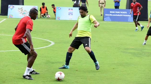 Babul Supriyo vies for the ball with French World Cup winner Marcel Desailly. (Hindustan Times) Babul Supriyo vies for the ball with French World Cup winner Marcel Desailly. (Hindustan Times)