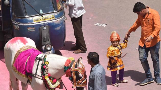 A child dressed as Shivaji Maharaj during Ganesh visarjan procession in Pune on Tuesday.  (Pratham Gokhale/HT PHOTO) 