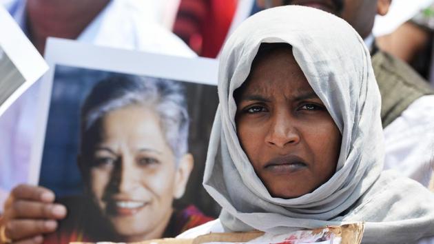 An Indian protester takes part in a rally condemning the killing of journalist Gauri Lankesh in Bangalore on September 6. (AFP) An Indian protester takes part in a rally condemning the killing of journalist Gauri Lankesh in Bangalore on September 6. (AFP)