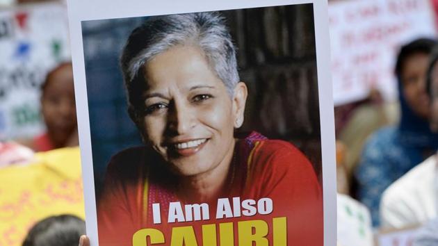 Protesters at a rally condemning the killing of journalist Gauri Lankesh in Bengaluru on September 6, 2017. Indian activists, politicians and journalists have demanded an investigation into the murder of Lankesh, a newspaper editor and outspoken critic of Hindu extremism whose death has sent shock waves across the country. (AFP Photo) Protesters at a rally condemning the killing of journalist Gauri Lankesh in Bengaluru on September 6, 2017. Indian activists, politicians and journalists have demanded an investigation into the murder of Lankesh, a newspaper editor and outspoken critic of Hindu extremism whose death has sent shock waves across the country. (AFP Photo)