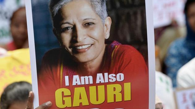 Indian protesters take part in a rally condemning the killing of journalist Gauri Lankesh in Bangalore on September 6, 2017. (AFP) Indian protesters take part in a rally condemning the killing of journalist Gauri Lankesh in Bangalore on September 6, 2017. (AFP)