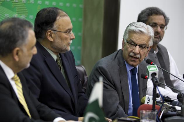 Foreign minister Khawaja Asif (second from right) along with interior minister Ahsan Iqbal and Prime Minister Shahid Khaqan Abbasi in Islamabad on July 10, 2017. (AP) Foreign minister Khawaja Asif (second from right) along with interior minister Ahsan Iqbal and Prime Minister Shahid Khaqan Abbasi in Islamabad on July 10, 2017. (AP)