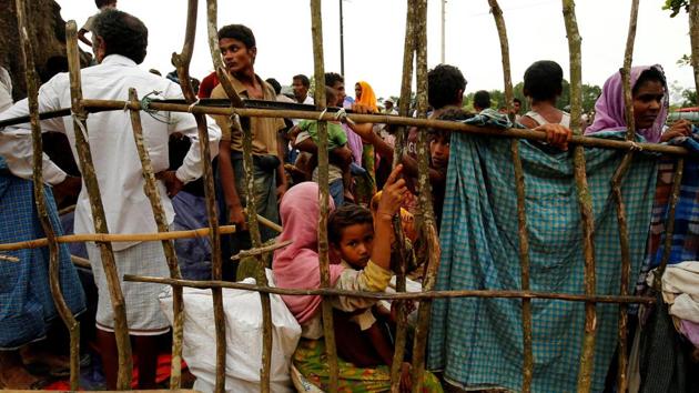 Myanmar’s nearly 1 million Rohingya, settled mostly in the Rakhine state have been reviled by many in Myanmar as illegal immigrants, suffering from systematic discrimination and the government’s denial of citizenship, rendering them stateless. Stringent restrictions have been placed on Rohingya people’s freedom of movement, access to medical assistance, education and other basic services which UN Secretary General Antonio Guterres has also condemned. (Mohammad Ponir Hossain / Reuters) Myanmar’s nearly 1 million Rohingya, settled mostly in the Rakhine state have been reviled by many in Myanmar as illegal immigrants, suffering from systematic discrimination and the government’s denial of citizenship, rendering them stateless. Stringent restrictions have been placed on Rohingya people’s freedom of movement, access to medical assistance, education and other basic services which UN Secretary General Antonio Guterres has also condemned. (Mohammad Ponir Hossain / Reuters)