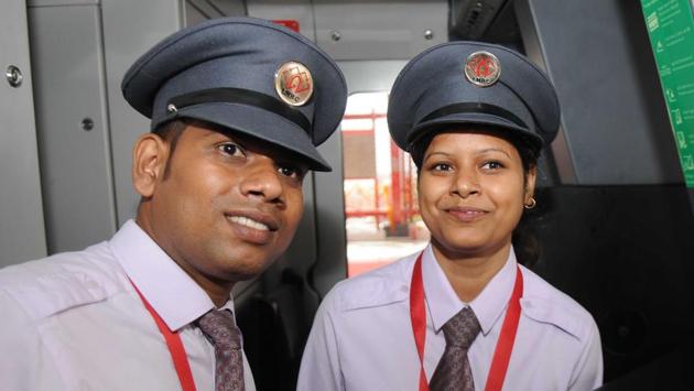 First Lucknow metro driver Puja poses for a photo during the inauguration of Lucknow metro. ‘Inspired by the heritage of Lucknow, the exterior of the train is a tribute to the cultural richness of the city of nawabs. The exterior livery in golden colour is inspired by chikankari. The front portion of the train symbolises the spirit of Rumi Gate, Bara-Imambara and Asifi Masjid. The black colour used in the front portion of the coach gives it a modern feel synonymous with Hazratganj’, added Keshav. (Subhankar Chakraborty/HT PHOTO) 