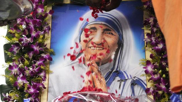iBefore canonization of Mother Teresa, crowd offering flowers to Mother outside Mother House at A J C Boose road in Kolkata, India, on Sunday, September 4, 2016. (Samir Jana/HT PHOTO Files) iBefore canonization of Mother Teresa, crowd offering flowers to Mother outside Mother House at A J C Boose road in Kolkata, India, on Sunday, September 4, 2016. (Samir Jana/HT PHOTO Files)
