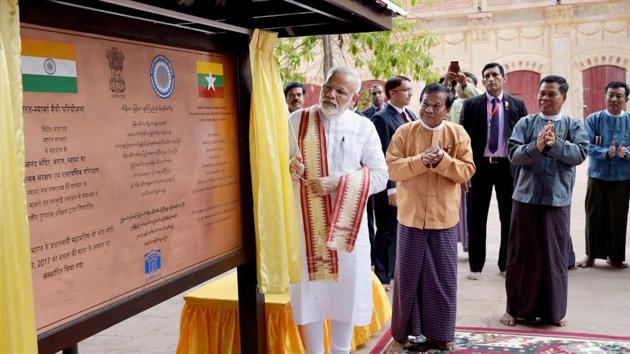 Prime Minister Narendra Modi unveils a plaque signifying the contribution of India, in the restoration of the Ananda Temple, in Bagan, Myanmar . (PTI) Prime Minister Narendra Modi unveils a plaque signifying the contribution of India, in the restoration of the Ananda Temple, in Bagan, Myanmar . (PTI)