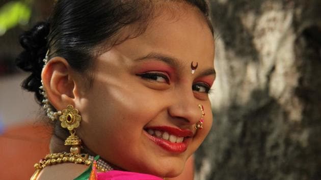 In a docu-short for Arre.co.in, she said that she faced no criticism, negative comments or gender bias given that the heavy Nashik Dhol was a male dominated form of performance art. (Video here: http://www.arre.co.in/music/aga-bai-tasha-ganeshas-drummer-girls/) (Pramod Thakur/HT PHOTO) In a docu-short for Arre.co.in, she said that she faced no criticism, negative comments or gender bias given that the heavy Nashik Dhol was a male dominated form of performance art. (Video here: http://www.arre.co.in/music/aga-bai-tasha-ganeshas-drummer-girls/) (Pramod Thakur/HT PHOTO)