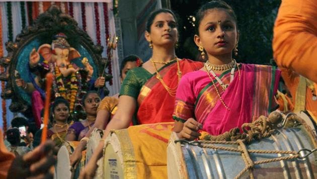 On the last day of Ganpati Visarjan, Vainavi Parag Mohite, dressed in a traditional Maharashtrian saree took to the streets along with her group to play a traditional Nashik Dhol and bid adieu to Lord Ganesha. At 11, she is one of the city’s youngest Nashik Dhol players. (Pramod Thakur/HT PHOTO) On the last day of Ganpati Visarjan, Vainavi Parag Mohite, dressed in a traditional Maharashtrian saree took to the streets along with her group to play a traditional Nashik Dhol and bid adieu to Lord Ganesha. At 11, she is one of the city’s youngest Nashik Dhol players. (Pramod Thakur/HT PHOTO)