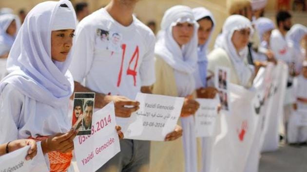 Yazidis attend a commemoration of the third anniversary of the Yazidi genocide in Sinjar region, Iraq August 3, 2017. (REUTERS File Photo) Yazidis attend a commemoration of the third anniversary of the Yazidi genocide in Sinjar region, Iraq August 3, 2017. (REUTERS File Photo)