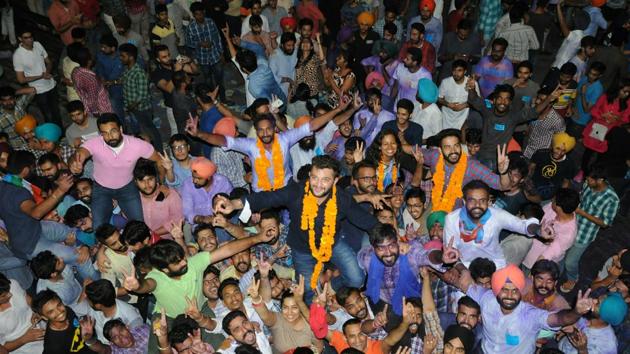 Students celebrate after NSUI won three key pots in the Panjab University student election on Thursday. (HT Photo) Students celebrate after NSUI won three key pots in the Panjab University student election on Thursday. (HT Photo)