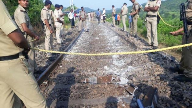 Police at the site where the derailment took place near Sonbhadra in Uttar Pradesh on September 7.(HT Photo)