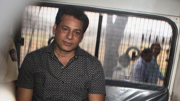 File photo of Abu Salem being taken to a court in Mumbai.(Anshuman Poyrekar/HT Photo)