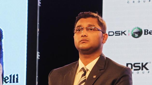 Shirish Kulkarni, a commerce graduate, was looking after DSK’s auto business till recently.(Hindustan Times)